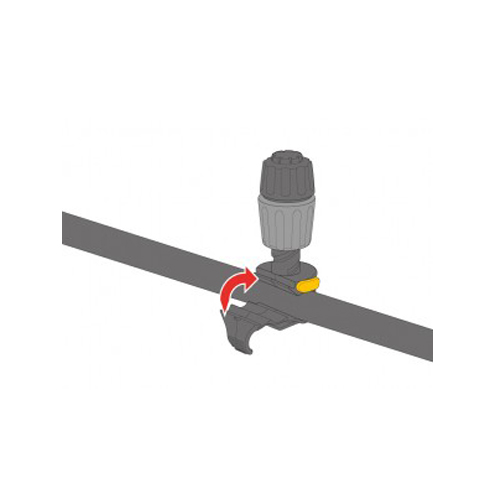 Illustration montrant un goutteur d'irrigation fixé sur un tuyau, avec une flèche indiquant la direction pour ajuster ou fixer l'appareil.